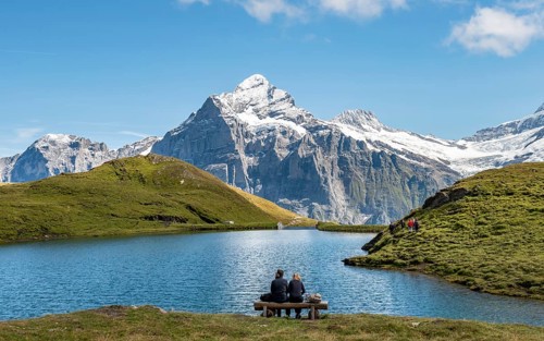 Hikers resting on a bench