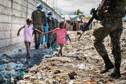 Two children and UN patrol