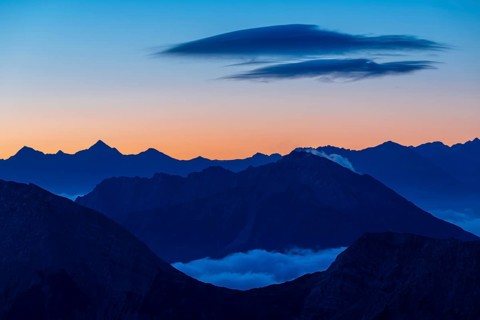 Sunrise over Lechtal Alps with fog in the valley
