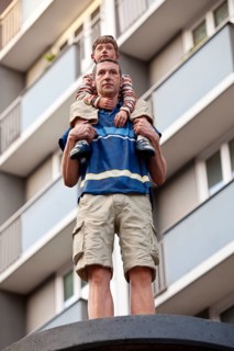 Sculpture Column saints father and son on an advertising pillar