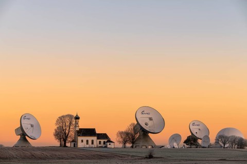 Chapel St. Johann with parabolic antenna at blue hour