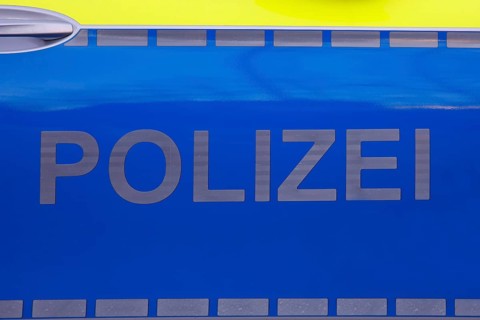 Police vehicle with police lettering on the side door