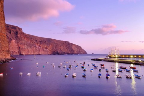 Fishing boats in the fishing port at dusk