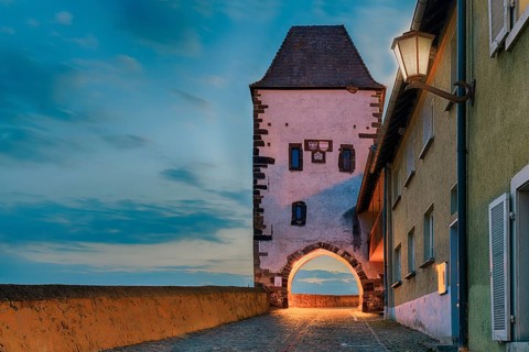 Hagenbachturm illuminated at dusk