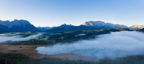 Wafts of mist over Barmsee near Kruen