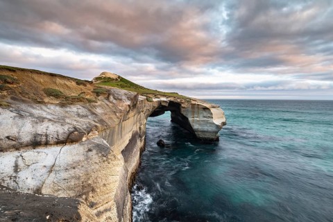 Rugged rock formation at Tunnel Beach