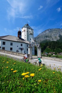 Cyclists in front of the pilgrimage church Mariastein