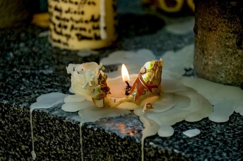 Burnt out sacrificial candle