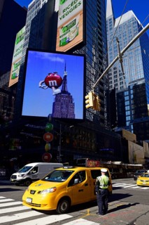 Traffic cop regulates traffic jam at Times Square