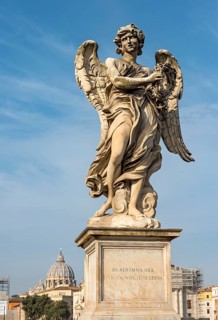 Angel statue and St. Peter's Basilica