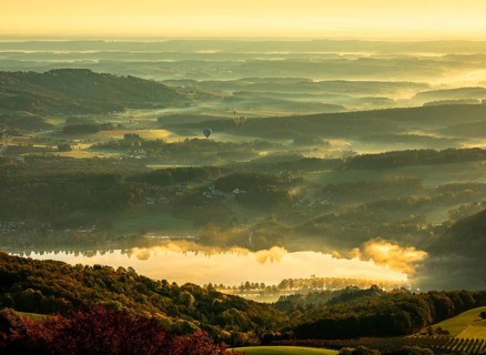 Stubenbergsee with autumn fog in the valley
