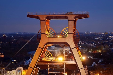 Illuminated winding tower of the Zeche Zollverein Shaft XII