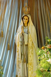 Statue of the Virgin Mary with golden crown of the Virgin Mary
