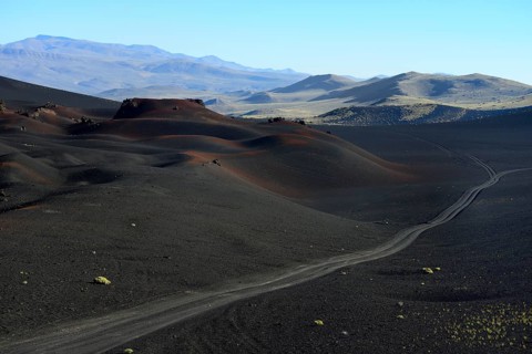Track through volcanic lunar landscape