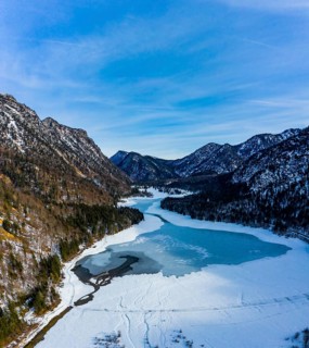Aerial view of the snow-covered Weitsee and Loedensee