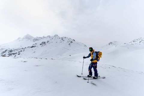 Ski tourers in the snow in fog