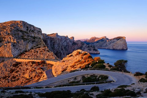 Serpentine road at Cap Formentor in the morning light