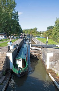 Narrowboat or canal boat passing through a lock on the Grand Union Canal