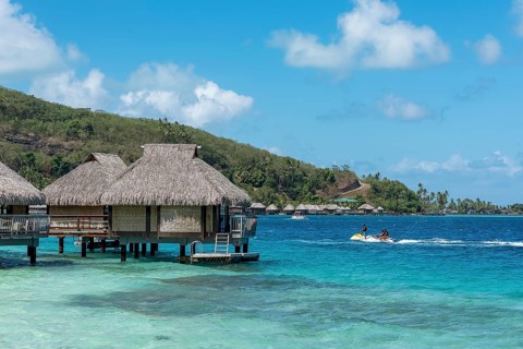 Overwater bungalows in the lagoon