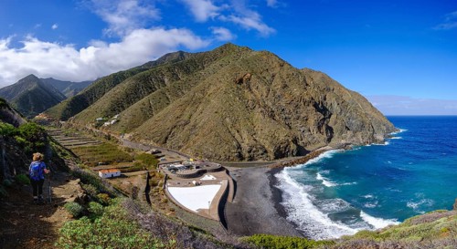 Woman hiking on hiking trail via Playa del Vallehermoso