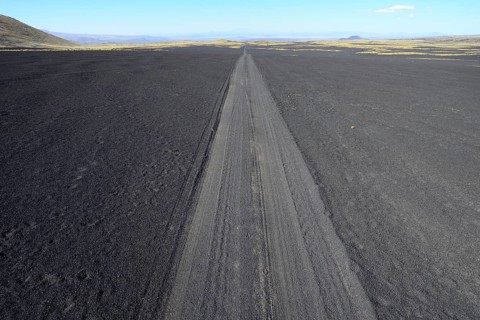Track through volcanic lunar landscape