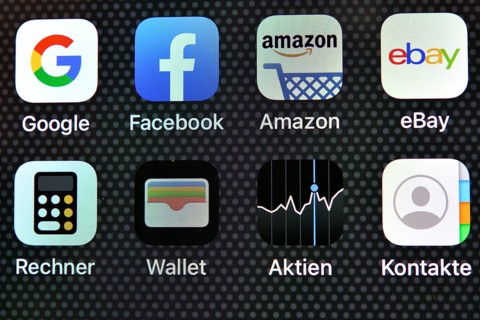 Various software apps on display of an Apple iPhone