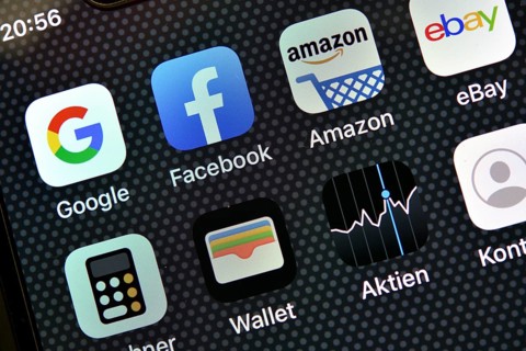 Various software apps on display of an Apple iPhone