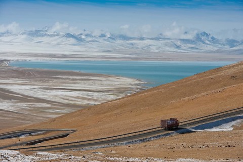 Truck driving pass from north on the way to sacred Namtso Lake