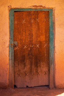 Entrance made of cactus wood with animal tendons