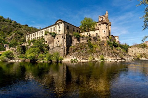 Lavoute-Chilhac village. Priory Sainte-Croix on the Allier river