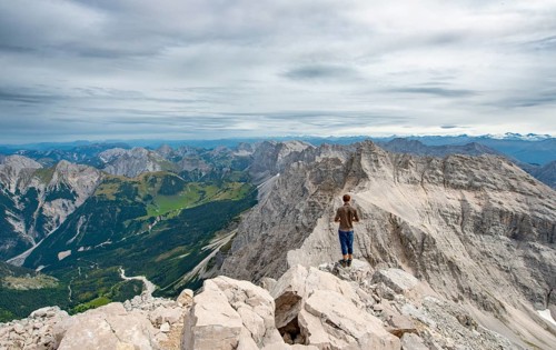 Hiker at the summit of the Birkkarspitze
