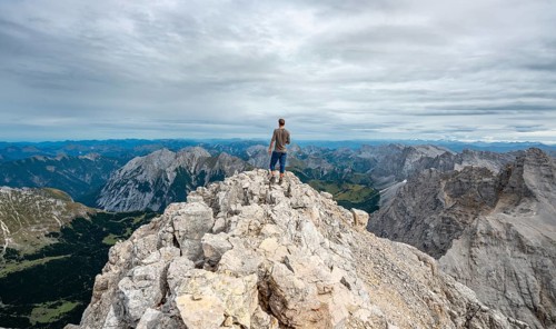 Hiker at the summit of the Birkkarspitze