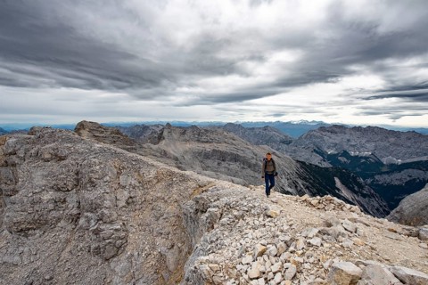 Mountaineer on the summit of the western Oedkarspitze