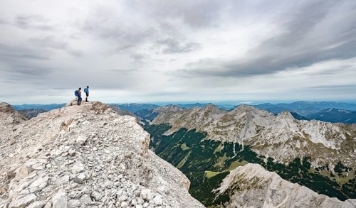 Hiker at the summit of the eastern Oedkarspitze