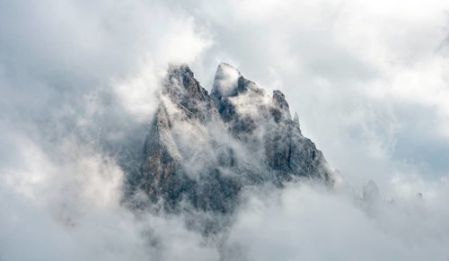 Cloud-covered rocky peaks