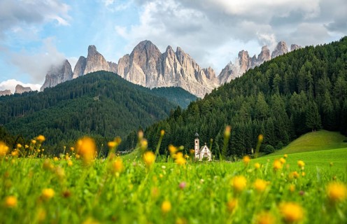 Church of St. John in Ranui with flower meadow
