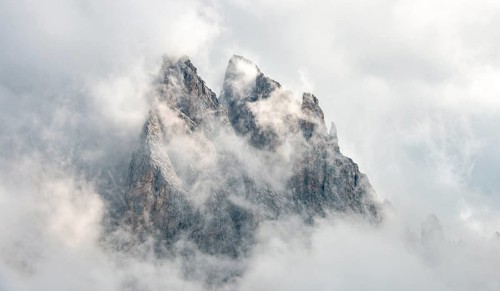 Cloud-covered rocky peaks