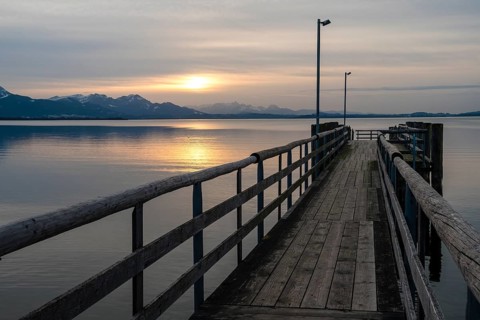Footbridge at sunset at Chiemsee