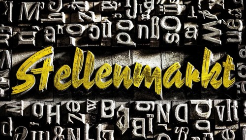 Old lead letters with golden writing show the word job market
