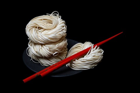 Asian nest noodles with chopsticks