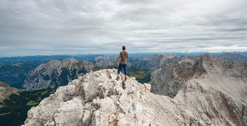 Hiker at the summit of the Birkkarspitze