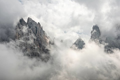 Cloud-covered rocky peaks