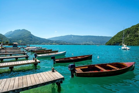 Annecy lake at Talloires village and Massif of Bauges