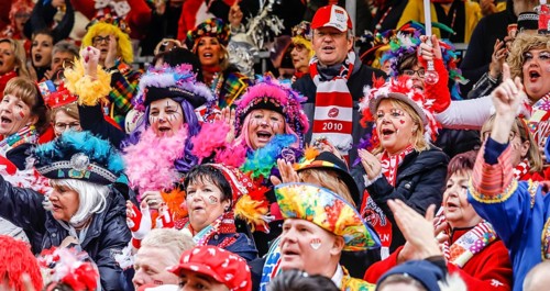 Colourfully costumed carnivalists celebrate carnival in Cologne