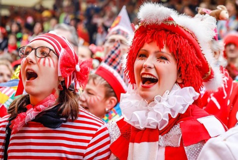 Colourfully costumed carnivalists celebrate carnival in Cologne