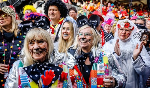 Colourfully costumed carnivalists celebrate carnival in Cologne