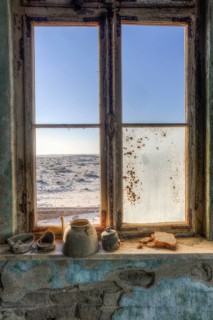 Window in the ruins of a residential building