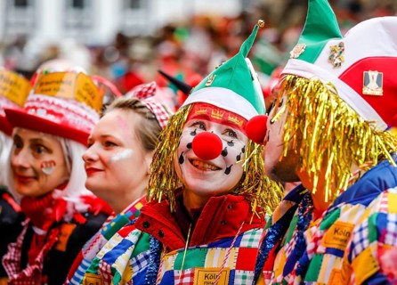 Colourfully costumed carnivalists celebrate carnival in Cologne
