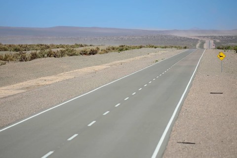 Lonely road through the plateau near Uspallata