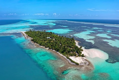 Uninhabited island on the outer reef